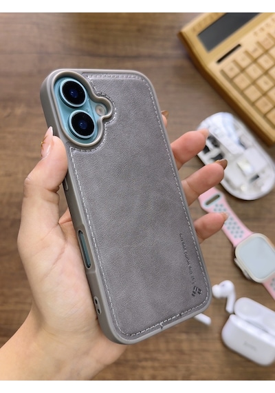 Apple iPhone 16 Uyumlu Premium Deri Dokulu Darbelere Karşı Dayanıklı Nazal Silikon Kılıf Gri