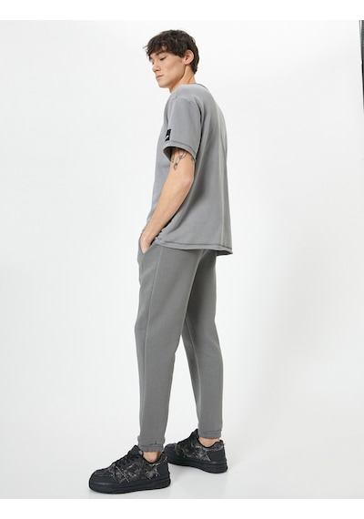 Koton Jogger Eşofman Altı Beli Bağcıklı Cep Detaylı Antrasit 4sam40058mk 4SAM40058MK928 Antrasit Koton Jogger Eşofman Altı Beli Bağcıklı Cep Detaylı Antrasit 4sam40058mk 4SAM40058MK928 Antrasit