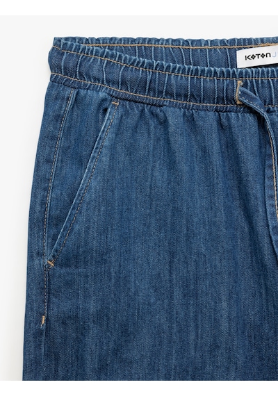 Koton Beli Bağcıklı Cep Detaylı Bermuda Oversize Jean Şort Koyu İndigo 5sam40126nd İndigo Koton Beli Bağcıklı Cep Detaylı Bermuda Oversize Jean Şort Koyu İndigo 5sam40126nd İndigo