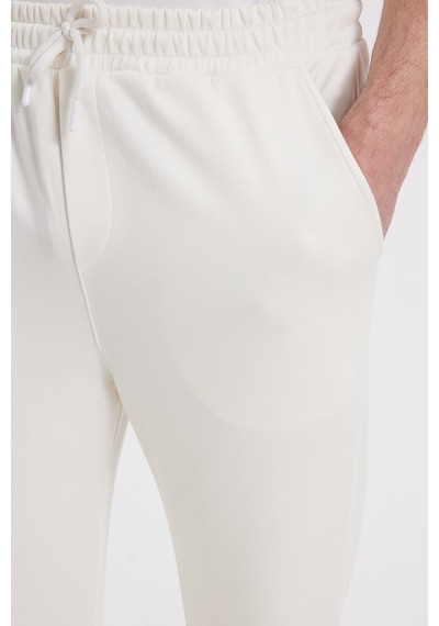 Tudors Erkek Ekru Baggy Fit Rahat Kesim Modal Kumaş Soft Doku Beli Bağcıklı Yan Cepli Eşofman Altı-46292 Tudors Erkek Ekru Baggy Fit Rahat Kesim Modal Kumaş Soft Doku Beli Bağcıklı Yan Cepli Eşofman Altı-46292