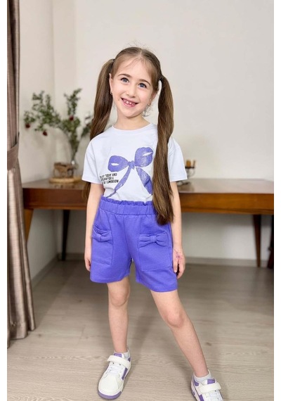Riccotarz Kız Çocuk Üzerinde Digital Kurdela Basklı T-shirt Ve Fiyonk Cep Detaylı Lila Şortlu Takım Riccotarz Kız Çocuk Üzerinde Digital Kurdela Basklı T-shirt Ve Fiyonk Cep Detaylı Lila Şortlu Takım