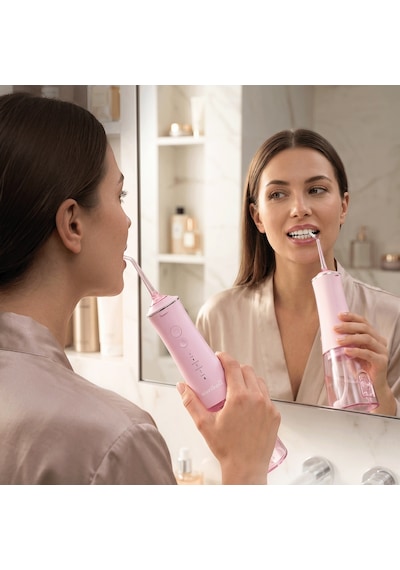 Steriball Oral Irrigator Ağız Duşu Pembe - 4 Temizlik Modu 360 Dönebilen Başlık 0,60 Mm İnce Su Akışı Yüksek Frekanslı Su Darbesi