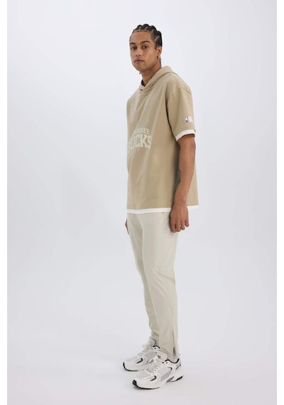 DeFactoFit Esnek Kumaş Sporcu Jogger Eşofman Altı Slim Fit Dar Kesim Dokuma Üç Cepli Fermuarlı Paça B2780AX25SPBG779