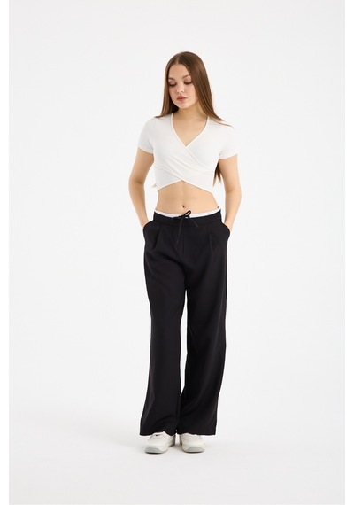 Gugus Kadın Wide Leg Kumaş Bol Paça Pantolon Beli Bağcıklı Beyaz Garni Detaylı Fermuar Kapamalı Siyah Gugus Kadın Wide Leg Kumaş Bol Paça Pantolon Beli Bağcıklı Beyaz Garni Detaylı Fermuar Kapamalı Siyah