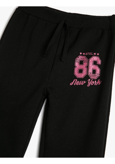 Koton Jogger Eşofman Altı Beli Bağlamalı Sim Baskı Detaylı Siyah 4skg40031ak 4SKG40031AK999 Siyah Koton Jogger Eşofman Altı Beli Bağlamalı Sim Baskı Detaylı Siyah 4skg40031ak 4SKG40031AK999 Siyah