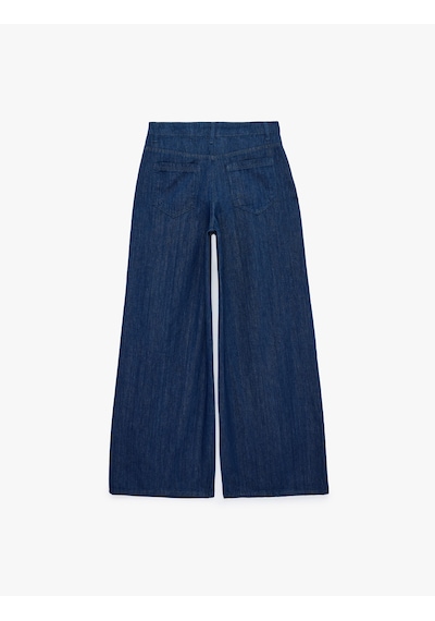 Koton Koton X Sima Tarkan - Rahat Kalıp Cepli Düğmeli Pileli Geniş Paça Denim Pantolon Koyu İndigo 6sal40251md Indigo Koton Koton X Sima Tarkan - Rahat Kalıp Cepli Düğmeli Pileli Geniş Paça Denim Pantolon Koyu İndigo 6sal40251md Indigo