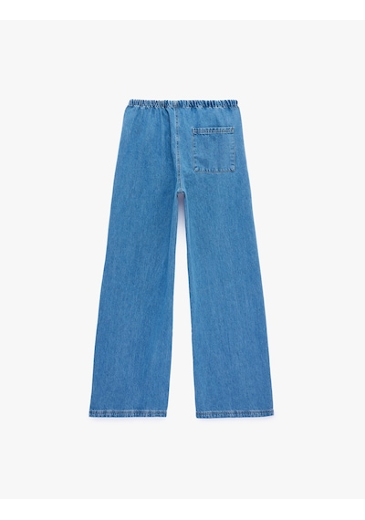 Koton Beli Bağcıklı Cep Detaylı Bol Paça Denim Pantolon Açık İndigo 6sal40041md