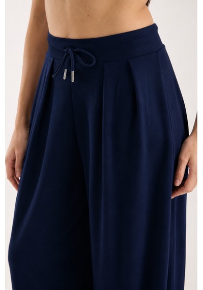 Gugus Kadın Modal Kumaş Şalvar Trend Model Paça Ve Bel Detaylı Rahat Kesim Eşofman Koyu Lacivert Gugus Kadın Modal Kumaş Şalvar Trend Model Paça Ve Bel Detaylı Rahat Kesim Eşofman Koyu Lacivert