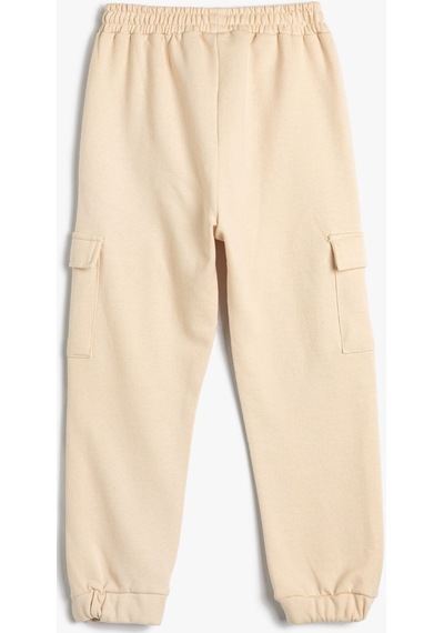 Koton Basic Kargo Jogger Eşofman Altı Cepli Beli Lastikli Bej 4wmg40161ak 4WMG40161AK050 Ekru Koton Basic Kargo Jogger Eşofman Altı Cepli Beli Lastikli Bej 4wmg40161ak 4WMG40161AK050 Ekru