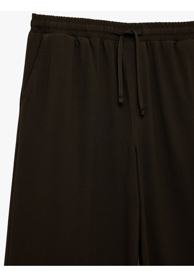 Koton Bol Kalıp Viskon Karışımlı Beli Bağcıklı Geniş Paça Pantolon Kahverengi 6sam40120hw Kahve Koton Bol Kalıp Viskon Karışımlı Beli Bağcıklı Geniş Paça Pantolon Kahverengi 6sam40120hw Kahve