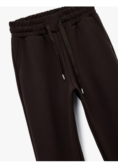 Koton Yüksek Bel Modal Karışımlı Bağcıklı Cepli Jogger Eşofman Altı Kahverengi 6wak40120nk Kahve