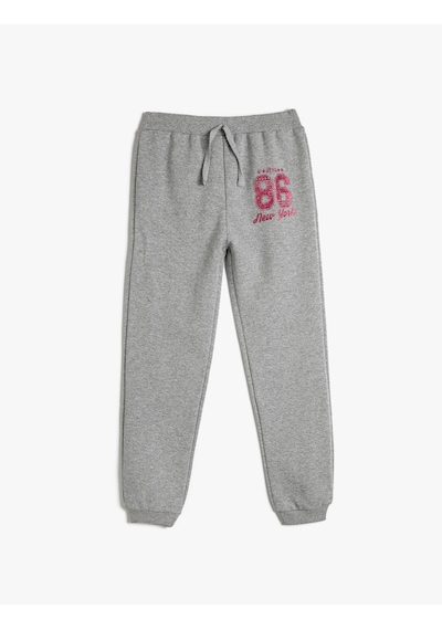 Koton Jogger Eşofman Altı Beli Bağlamalı Sim Baskı Detaylı Gri 4skg40031ak Gri Koton Jogger Eşofman Altı Beli Bağlamalı Sim Baskı Detaylı Gri 4skg40031ak Gri