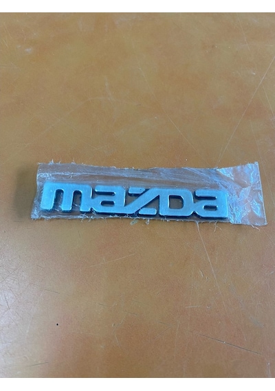 Mazda Yazısı Küçük Olan