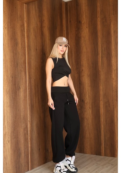 Ozy Fashion Kadın Beli Katlamalı Lastikli Bol Paça Stoper Detaylı 3 İplik Kışlık Eşofman Altı Siyah Ozy Fashion Kadın Beli Katlamalı Lastikli Bol Paça Stoper Detaylı 3 İplik Kışlık Eşofman Altı Siyah