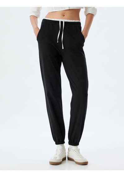 Koton Jogger Eşofman Altı Çift Bel Detaylı Bağcıklı Şardonlu Cepli Rahat Kalıp Siyah 5wal40066ık Siyah Koton Jogger Eşofman Altı Çift Bel Detaylı Bağcıklı Şardonlu Cepli Rahat Kalıp Siyah 5wal40066ık Siyah