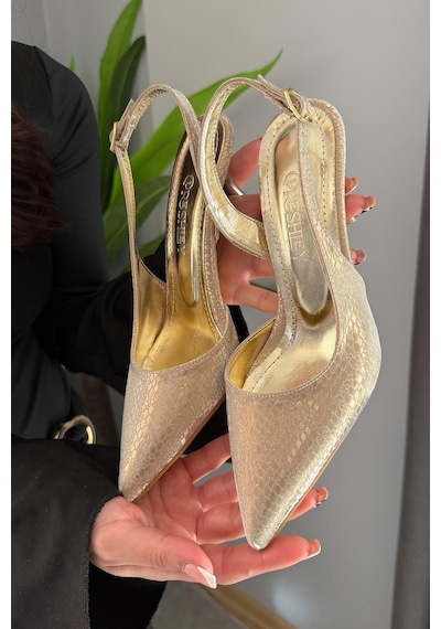 Preshley Kadın Siena Altın Baskılı 7 Cm Topuklu Sivri Burun Arkası Açık Atkılı Ayakkabı Altın Preshley Kadın Siena Altın Baskılı 7 Cm Topuklu Sivri Burun Arkası Açık Atkılı Ayakkabı Altın