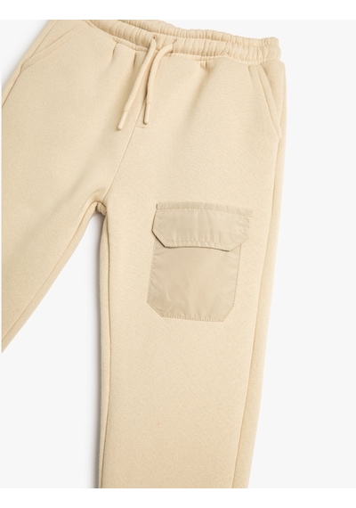Koton Basic Jogger Eşofman Altı Beli Bağlamalı Cep Detaylı Şardonlu Bej 4wkb40006tk Ekru