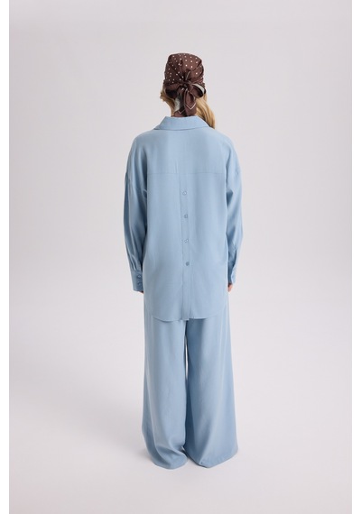 Mai Collection Mai Studios Co. Nunzia Arka Detaylı Mavi Oversize Gömlek Pantolon Takım mavi Mai Collection Mai Studios Co. Nunzia Arka Detaylı Mavi Oversize Gömlek Pantolon Takım mavi