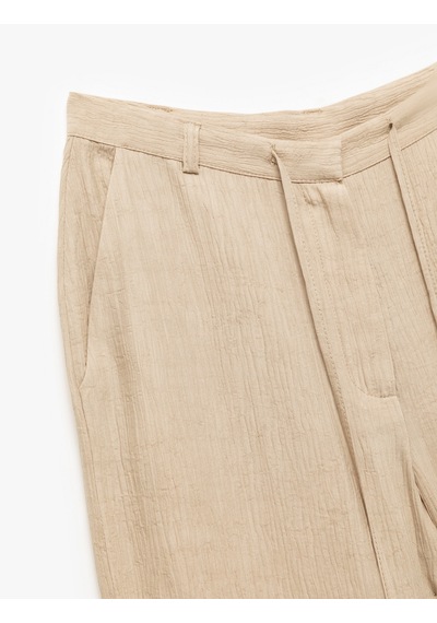Koton Viskon Karışımlı Beli Bağlamalı Cepli Dokulu Geniş Paça Pantolon Bej 5sak40172ew Ekru Koton Viskon Karışımlı Beli Bağlamalı Cepli Dokulu Geniş Paça Pantolon Bej 5sak40172ew Ekru