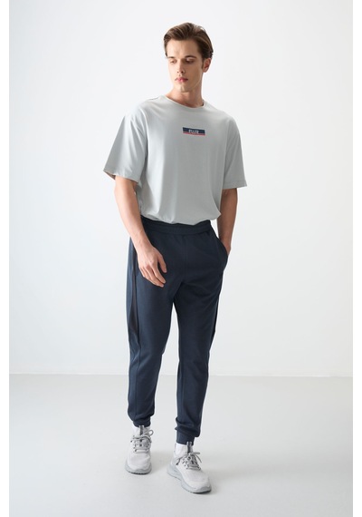 Tommy Life İndigo Yüzeyi Dokulu Standart Fit Nakışlı Erkek Eşofman Alt - 82126 İndigo