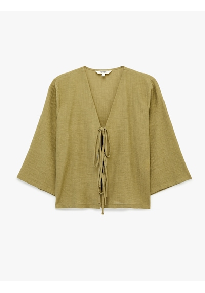 Koton Keten Karışımlı Uzun Geniş Kollu Önden Bağlamalı Fiyonk Detaylı Kısa Kimono Bluz Haki 6sak60133ew Haki Koton Keten Karışımlı Uzun Geniş Kollu Önden Bağlamalı Fiyonk Detaylı Kısa Kimono Bluz Haki 6sak60133ew Haki