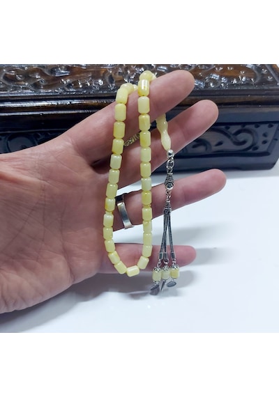 Damla Kehribar Kapsül Kesim Gümüş Püsküllü Tesbih... Damla Gr : 7,9 Gümüş Gr : 4,0 Ölçü : 6 X 9 Sarı - Beyaz Damla Kehribar Kapsül Kesim Gümüş Püsküllü Tesbih... Damla Gr : 7,9 Gümüş Gr : 4,0 Ölçü : 6 X 9 Sarı - Beyaz
