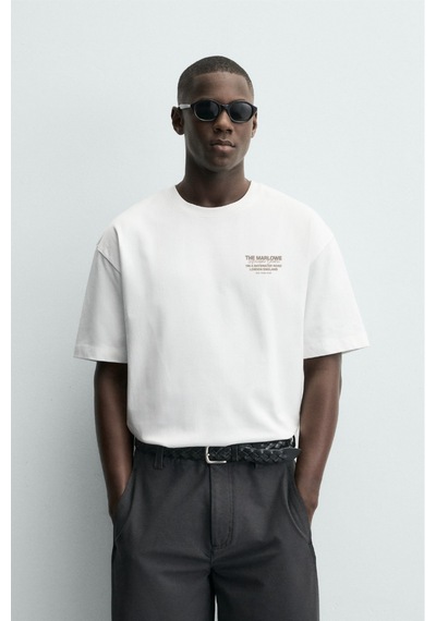 Modivibe Erkek Baskılı Oversize T-shirt Kalın Dokulu %100 Pamuk Geniş Kesim Beyazmarlowe Modivibe Erkek Baskılı Oversize T-shirt Kalın Dokulu %100 Pamuk Geniş Kesim Beyazmarlowe