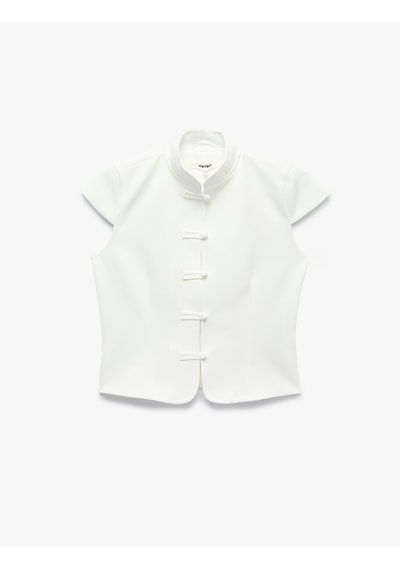 Koton Slim Fit Kap Kol Süslü Düğmeli Dik Mandarin Yaka Gömlek Napolyon Kapama Detaylı Kırık Beyaz 7wak60181pw Ekru Koton Slim Fit Kap Kol Süslü Düğmeli Dik Mandarin Yaka Gömlek Napolyon Kapama Detaylı Kırık Beyaz 7wak60181pw Ekru