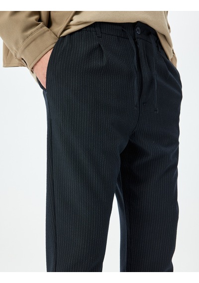 Koton Katlamalı Paça Viskon Karışımlı Düğmeli Beli Bağcıklı Slim Fit Pantolon Lacivert 5sam40034hw Lacivert Koton Katlamalı Paça Viskon Karışımlı Düğmeli Beli Bağcıklı Slim Fit Pantolon Lacivert 5sam40034hw Lacivert