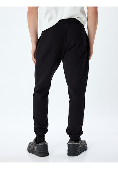 Koton Spor Eşofman Altı Jogger Slogan Baskılı Cep Detaylı Pamuk Karışımlı Siyah 5wam40041nk Siyah Koton Spor Eşofman Altı Jogger Slogan Baskılı Cep Detaylı Pamuk Karışımlı Siyah 5wam40041nk Siyah