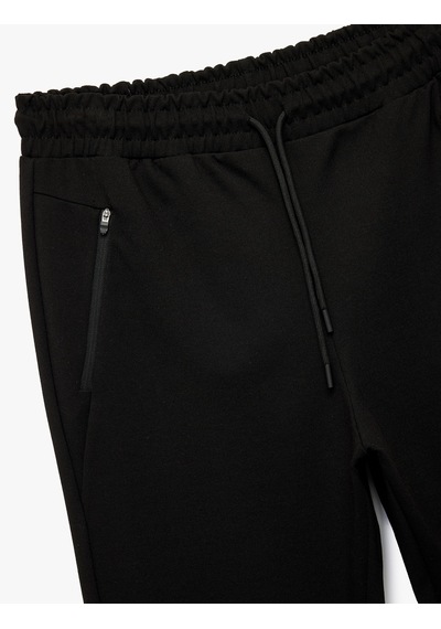 Koton Fermuarlı Cepli Beli Bağcıklı Viskon Karışımlı Spor Jogger Eşofman Altı Siyah 6wam40004nk Siyah Koton Fermuarlı Cepli Beli Bağcıklı Viskon Karışımlı Spor Jogger Eşofman Altı Siyah 6wam40004nk Siyah