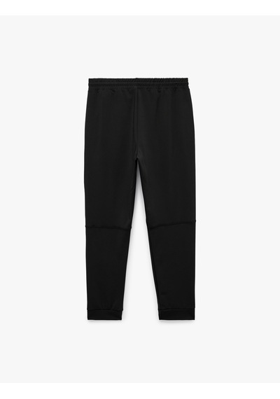 Koton Baskılı Paçası Lastikli Cepli Beli Bağcıklı Jogger Spor Eşofman Altı Siyah 7wam40077nk Koton Baskılı Paçası Lastikli Cepli Beli Bağcıklı Jogger Spor Eşofman Altı Siyah 7wam40077nk