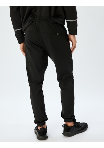 Koton Spor Eşofman Altı Jogger Beli Bağcıklı Fermuarlı Cep Detaylı Siyah 5wam40014nk Siyah Koton Spor Eşofman Altı Jogger Beli Bağcıklı Fermuarlı Cep Detaylı Siyah 5wam40014nk Siyah