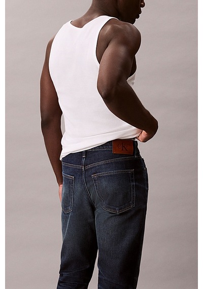 Calvin Klein Erkek Slim Tapered Fit Termal Kumaşlı Jean Pantolon - Koyu Mavi Dark Crescent Calvin Klein Erkek Slim Tapered Fit Termal Kumaşlı Jean Pantolon - Koyu Mavi Dark Crescent