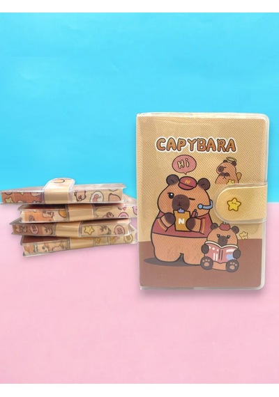 Capybara A7 Not Defteri , Çıt Çıtlı Cep Defteri - Kitap Okuyan Capybara Sarı