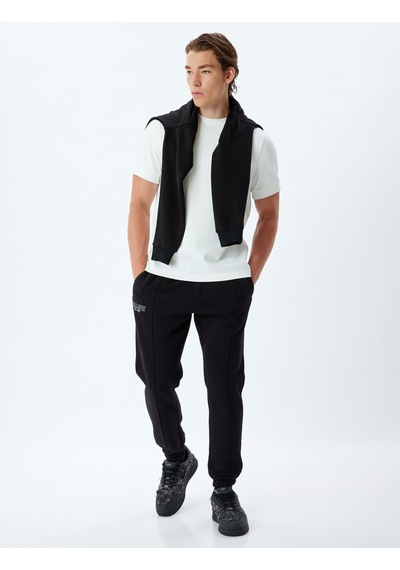 Koton Spor Eşofman Altı Jogger Slogan Baskılı Cep Detaylı Pamuk Karışımlı Siyah 5wam40041nk Siyah Koton Spor Eşofman Altı Jogger Slogan Baskılı Cep Detaylı Pamuk Karışımlı Siyah 5wam40041nk Siyah