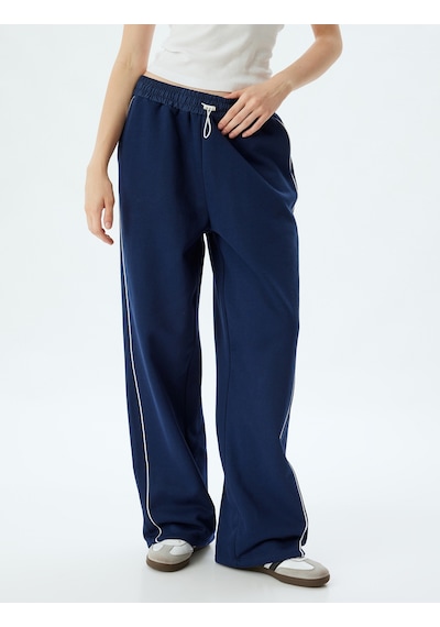 Koton Oversize Eşofman Altı Bol Paça Beli Lastikli Biyeli Cepli Lacivert 5wal40062ık Lacivert Koton Oversize Eşofman Altı Bol Paça Beli Lastikli Biyeli Cepli Lacivert 5wal40062ık Lacivert