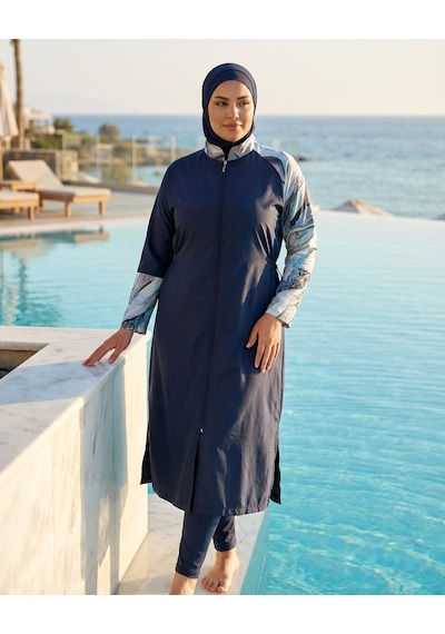 Pierre Cardin Büyük Beden Dik Yaka Paraşüt Kumaş Uzun Boydan Fermuarlı Beli Ayarlanabilir Bağcıklı Desen Detaylı Dar Paça Kadın Tesettür Mayo Lacivert Pierre Cardin Büyük Beden Dik Yaka Paraşüt Kumaş Uzun Boydan Fermuarlı Beli Ayarlanabilir Bağcıklı Desen Detaylı Dar Paça Kadın Tesettür Mayo Lacivert