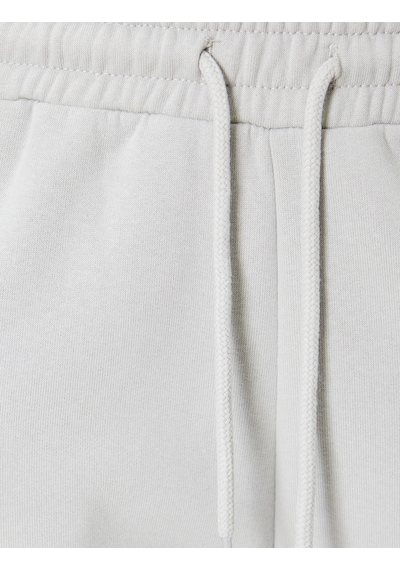 Koton Şardonlu Jogger Eşofman Altı Beli Bağcıklı Cepli Standart Bel Rahat Kalıp Gri 5wal40018ık Gri Koton Şardonlu Jogger Eşofman Altı Beli Bağcıklı Cepli Standart Bel Rahat Kalıp Gri 5wal40018ık Gri