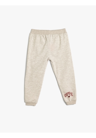 Koton Jogger Eşofman Altı Şardonlu Baskı Detaylı Beli Lastikli Bej 5wmg40068ak Ekru