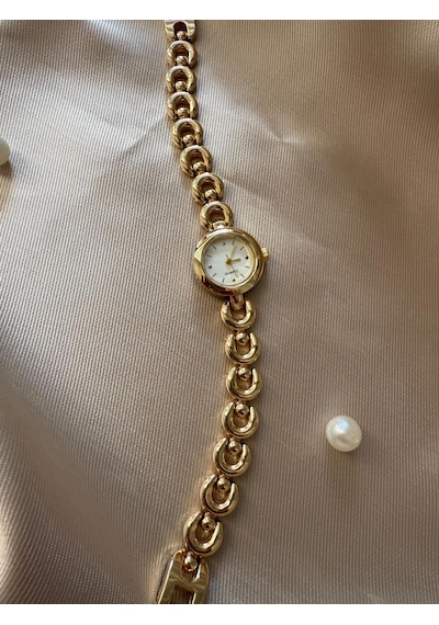 Retro Minimal Boncuk Kordon Vintage Kadın Kol Saati Yuvarlak Altın