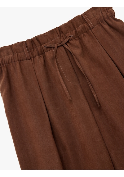 Koton Rahat Kalıp Beli Lastikli Bağcıklı Pile Detaylı Bol Paça Pantolon Kahverengi 6wak40065pw Kahve Koton Rahat Kalıp Beli Lastikli Bağcıklı Pile Detaylı Bol Paça Pantolon Kahverengi 6wak40065pw Kahve