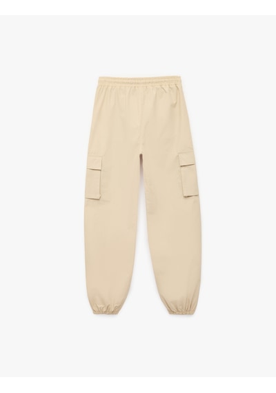 Koton Pamuklu Kapaklı Cep Detaylı Beli Bağcıklı Oversize Jogger Pantolon Bej 6skb40069tw Ekru