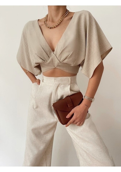 Fashion Cocktail Kısa Kol V-yaka Keten Sırt Bağlama Mini Karın Dekolteli Yazlık Kombin Crop Bluz Krem Fashion Cocktail Kısa Kol V-yaka Keten Sırt Bağlama Mini Karın Dekolteli Yazlık Kombin Crop Bluz Krem
