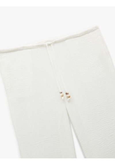 Koton Keten Görünümlü Rahat Kalıp Beli Bağlamalı Bol Paça Plaj Pantolonu Beyaz 5sak60010mw Koton Keten Görünümlü Rahat Kalıp Beli Bağlamalı Bol Paça Plaj Pantolonu Beyaz 5sak60010mw