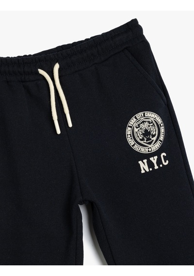 Koton Jogger Eşofman Altı Baskı Detaylı Beli Bağlamalı Cepli Şardonlu Lacivert 5wkb40088tk Lacivert