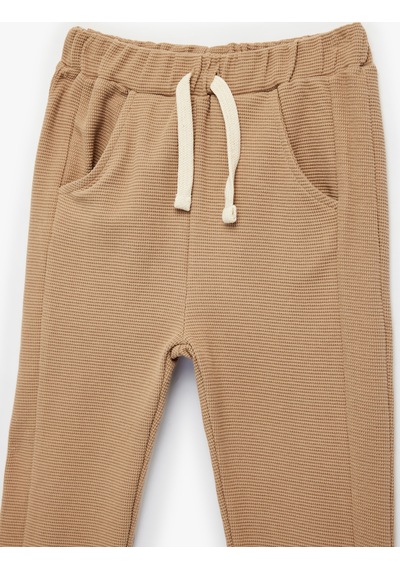 Koton Waffle Kumaş Pamuklu Beli Bağlamalı Lastikli Paça Jogger Eşofman Altı Kahverengi 6smb40013tk Kahve Koton Waffle Kumaş Pamuklu Beli Bağlamalı Lastikli Paça Jogger Eşofman Altı Kahverengi 6smb40013tk Kahve