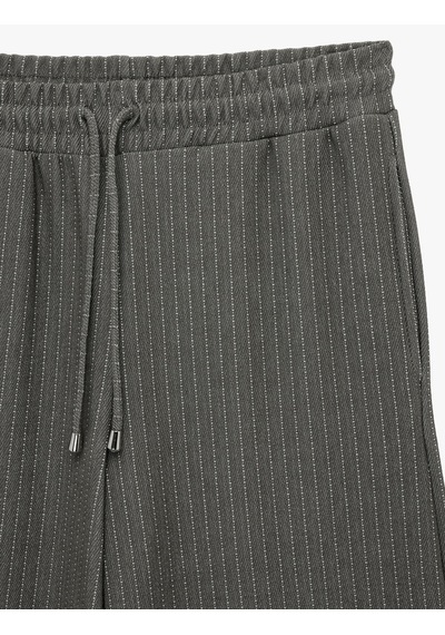 Koton Beli Bağcıklı Cepli Düz Bol Paça Çizgili Pantolon Haki Çizgili 6sak40076ek