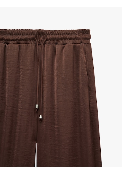 Koton Beli Lastikli Bağlamalı Cepli Geniş Paça Saten Pantolon Kahverengi 6sak40206pw Kahve Koton Beli Lastikli Bağlamalı Cepli Geniş Paça Saten Pantolon Kahverengi 6sak40206pw Kahve