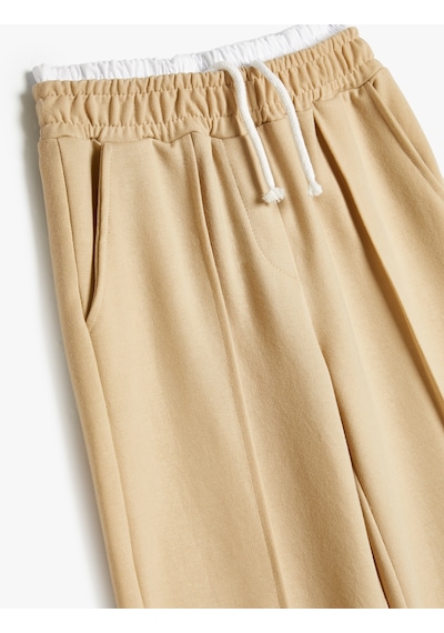 Koton Basic Bol Paça Pantolon Cepli Çift Bel Detaylı Bej 4skg40213ak Ekru